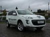 Peugeot 4007 на фоне Казанского кремля