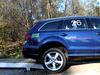 Audi Q7 на искусственных неровностях. Задняя часть автомобиля