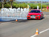 Audi A5 Sportback объезжает водное препятствие, крупный план