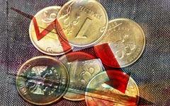 Девальвация рубля возможна уже летом